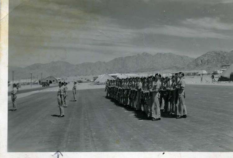 A-coy presting arms to Col Bamford 3 platoons